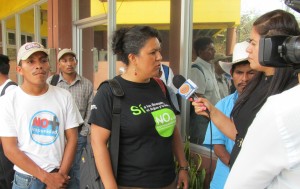 Berta Caceres speaks at a press conference. Photo by Beverly Bell.